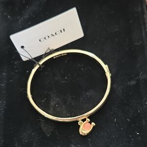 Coach Gold Bracelet with Pink Charm